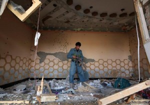 An Afghan police inspects a house after a suicide attack at an elders meeting gathering on the outskirts of Jalalabad city, Afghanistan October 31, 2016. REUTERS/Parwiz