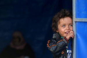 A displaced child, who fled Mosul due to Islamic State violence, is seen in Khazer refugee camp, east of Mosul, Iraq. REUTERS/Alaa Al-Marjani