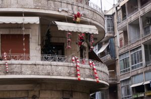 Christmas ornaments decorate a balcony in Aleppo, Syria December 12, 2009. REUTERS/Khalil Ashawi