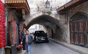 A man walks past a shop in al-Jdeideh neighbourhood, in the Old City of Aleppo, Syria December 12, 2009. REUTERS/Khalil Ashawi