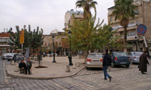 People walk in al-Jdeideh neighbourhood, in the Old City of Aleppo, Syria December 12, 2009. REUTERS/Khalil Ashawi